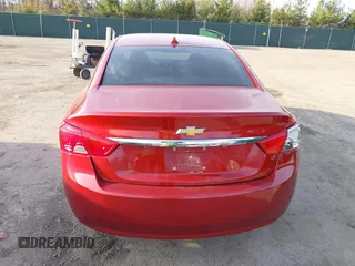 2014 Chevrolet Impala LT with VIN 2G1125S38E9314424, listed as a IAAI auction lot 41973052 with 186,209 mi miles and . Bid and sale history available at DreamBid. Image 16.