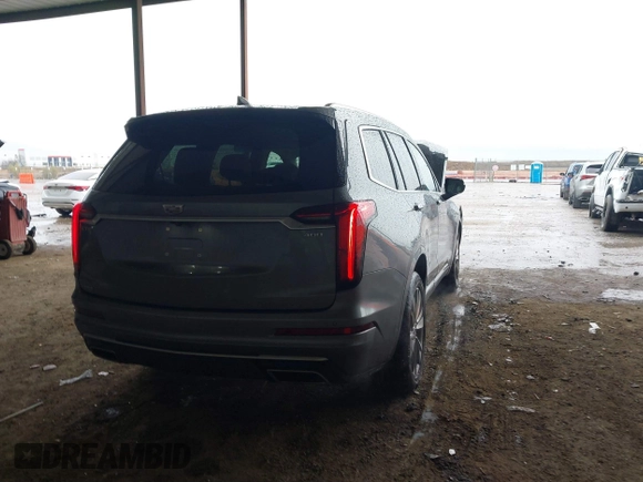 2022 Cadillac XT6 Premium Luxury z VIN 1GYKPDRS1NZ108012, wystawiony jako IAAI lot #41178333 z przebiegiem 83 987 mil mil oraz . Historia ofert i sprzedaży dostępna na DreamBid. Obrazek 4.