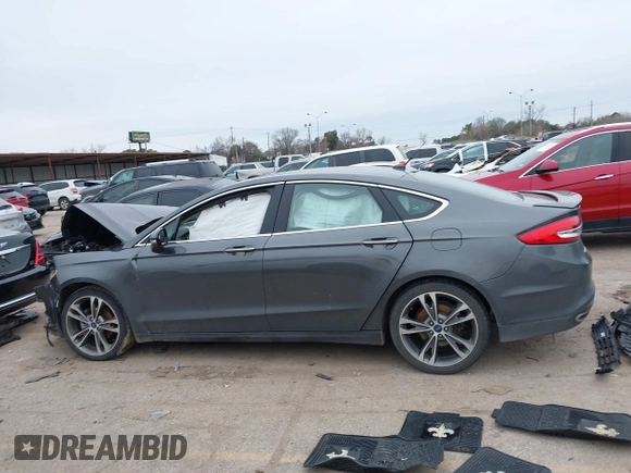 2017 Ford Fusion Titanium with VIN 3FA6P0K93HR416160, listed as a IAAI auction lot 41636451 with 100,383 mi miles. Bid and sale history available at carsss.com. Image 14.