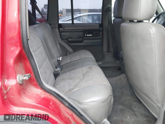 1996 Jeep Cherokee Country with VIN 1J4FJ78S3TL116814, listed as a IAAI auction lot 42131760 with 209,510 mi miles and . Bid and sale history available at DreamBid. Image 8.