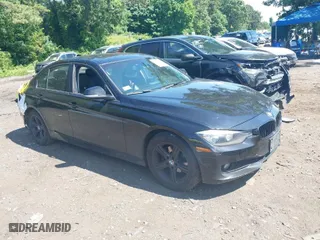 2014 BMW 3 Series 320i xDrive with VIN WBA3C3G51ENS70935, listed as a IAAI auction lot 39754065 with 233,973 mi miles. Bid and sale history available at carsss.com. Image 1.