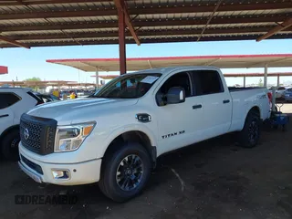 2019 Nissan Titan Pro-4X with VIN 1N6BA1F45KN533051, listed as a IAAI auction lot 42587343 with 134,768 mi miles and . Bid and sale history available at DreamBid. Image 17.