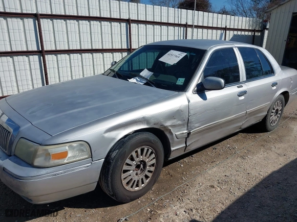 2007 Mercury Grand Marquis LS with VIN 2MEFM75V77X601170, listed as a IAAI auction lot 41517369 with 210,800 mi miles. Bid and sale history available at carsss.com. Image 6.