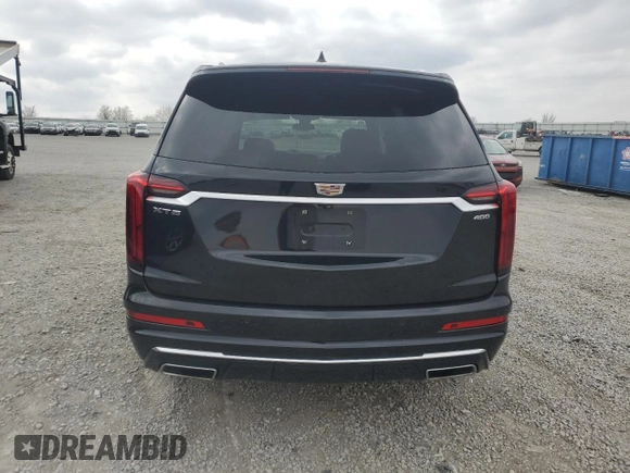2020 Cadillac XT6 FWD Premium Luxury with VIN 1GYKPCRS2LZ138174, listed as a Copart auction lot 52495655 with 30,822 mi miles and Salvage Title. Bid and sale history available at carsss.com. Image 6.