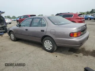 1992 Toyota Camry с VIN 4T1SK11E8NU009222, выставлен на аукционе Copart как лот 60811625 с пробегом 143 925 миль миль и Чистый • Clean title. История ставок и продаж доступна на DreamBid. Изображение 2.