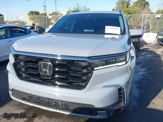2024 Honda Pilot Touring with VIN 5FNYG1H74RB020112, listed as a IAAI auction lot 41698998 with 11,612 mi miles. Bid and sale history available at carsss.com. Image 12.
