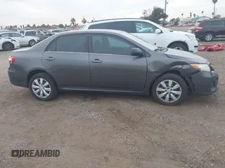 2013 Toyota Corolla L with VIN 5YFBU4EE0DP198647, listed as a IAAI auction lot 41019337 with 155,749 mi miles and . Bid and sale history available at DreamBid. Image 13.