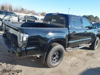 2017 Toyota Tacoma SR5 with VIN 3TMAZ5CN0HM039064, listed as a IAAI auction lot 41295063 with 64,010 mi miles. Bid and sale history available at carsss.com. Image 4.