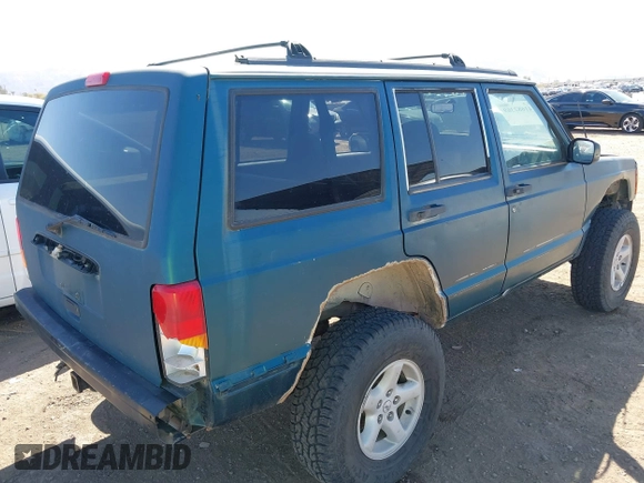1997 Jeep Cherokee Sport with VIN 1J4FJ68S4VL592390, listed as a IAAI auction lot 41682369 with 194,624 mi miles. Bid and sale history available at carsss.com. Image 4.