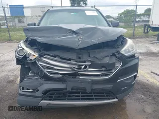 2018 Hyundai Santa Fe 2.4L with VIN 5XYZT3LB5JG539917, listed as a IAAI auction lot 41975300 with 214,562 mi miles and . Bid and sale history available at DreamBid. Image 6.