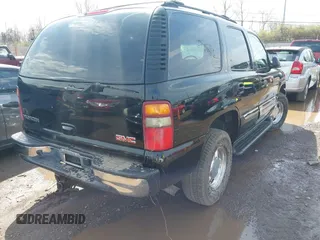 2003 GMC Yukon SLT z VIN 1GKEK13Z63R231442, wystawiony jako IAAI lot #41908031 z przebiegiem 240 317 mil mil oraz . Historia ofert i sprzedaży dostępna na DreamBid. Obrazek 4.