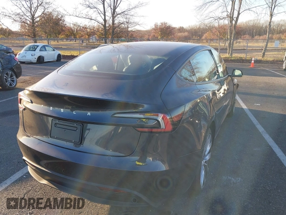 2024 Tesla Model 3 with VIN 5YJ3E1EA7RF853483, listed as a IAAI auction lot 40863575 with 1,173 mi miles and . Bid and sale history available at carsss.com. Image 4.