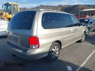 2002 Kia Sedona LX with VIN KNDUP131326280553, listed as a IAAI auction lot 41831101 with 342,242 mi miles. Bid and sale history available at carsss.com. Image 4.