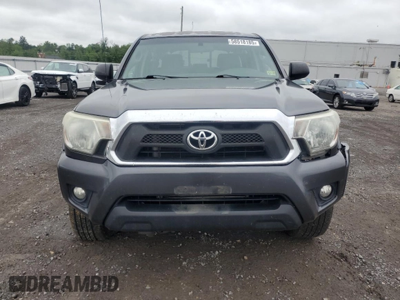 2015 Toyota Tacoma with VIN 3TMLU4EN6FM203591, listed as a Copart auction lot 58518185 with 149,729 mi miles and Salvage title. Bid and sale history available at DreamBid. Image 5.