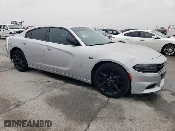 2020 Dodge Charger SXT with VIN 2C3CDXBG9LH176716, listed as a Copart auction lot 45742635 with 101,590 mi miles and Salvage Title. Bid and sale history available at DreamBid. Image 4.