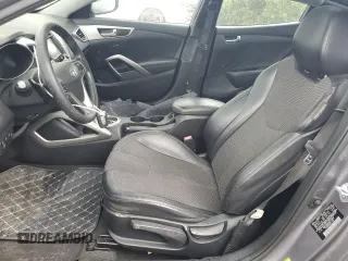 2012 Hyundai Veloster w/Gray Int z VIN KMHTC6AD9CU079542, wystawiony jako Copart lot #55998045 z przebiegiem 98 065 mil mil oraz Szkoda całkowita • Salvage title. Historia ofert i sprzedaży dostępna na DreamBid. Obrazek 7.