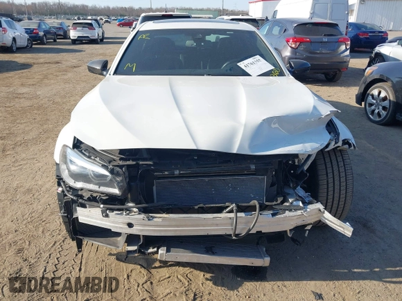 2015 BMW M5 z VIN WBSFV9C53FD594181, wystawiony jako IAAI lot #41761355 z przebiegiem Nie podano mil oraz . Historia ofert i sprzedaży dostępna na DreamBid. Obrazek 12.