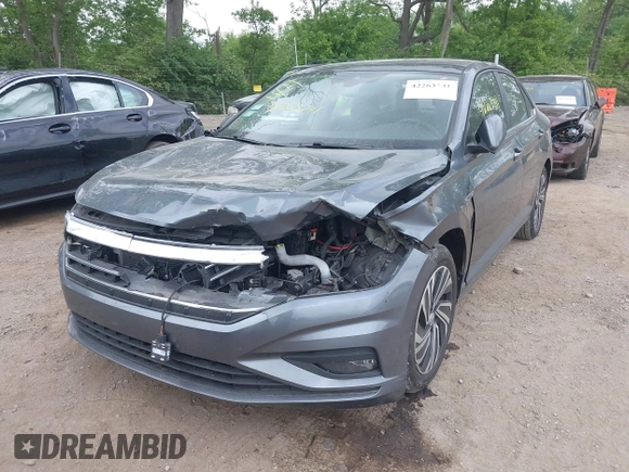 2021 Volkswagen Jetta SEL Premium z VIN 3VWG57BU8MM017203, wystawiony jako IAAI lot #42263741 z przebiegiem 26 556 mil mil oraz . Historia ofert i sprzedaży dostępna na DreamBid. Obrazek 17.