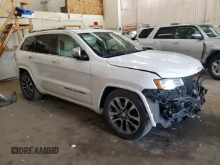2017 Jeep Grand Cherokee Overland z VIN 1C4RJFCG8HC809868, wystawiony jako Copart lot #64056155 z przebiegiem 54 136 mil mil oraz Szkoda całkowita • Salvage title. Historia ofert i sprzedaży dostępna na DreamBid. Obrazek 4.