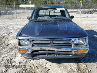 1993 Toyota Pickup DLX z VIN JT4RN93P7P5080335, wystawiony jako Copart lot #84757234 z przebiegiem 162 290 mil mil oraz Szkoda całkowita • Salvage title. Historia ofert i sprzedaży dostępna na DreamBid. Obrazek 5.