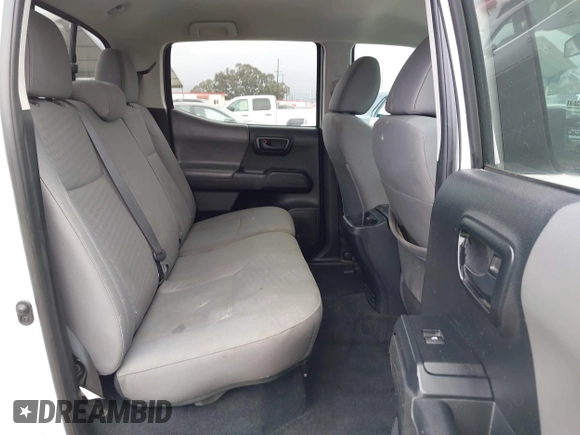 2021 Toyota Tacoma SR with VIN 3TYAX5GNXMT032184, listed as a IAAI auction lot 42204429 with 60,295 mi miles and . Bid and sale history available at DreamBid. Image 8.