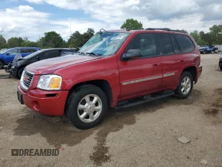 2004 GMC Envoy SLE with VIN 1GKDT13S142396966, listed as a Copart auction lot 58662725 with Not provided miles and Salvage title. Bid and sale history available at DreamBid. Image 1.