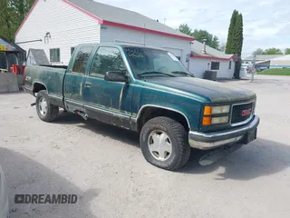 1997 GMC Sierra 1500 z VIN 2GTEK19R1V1509663, wystawiony jako IAAI lot #42374525 z przebiegiem 138 392 mil mil oraz . Historia ofert i sprzedaży dostępna na DreamBid. Obrazek 1.
