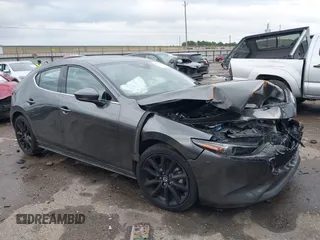2021 Mazda 3 Premium with VIN JM1BPAML1M1318708, listed as a IAAI auction lot 42178243 with 62,455 mi miles and . Bid and sale history available at DreamBid. Image 1.
