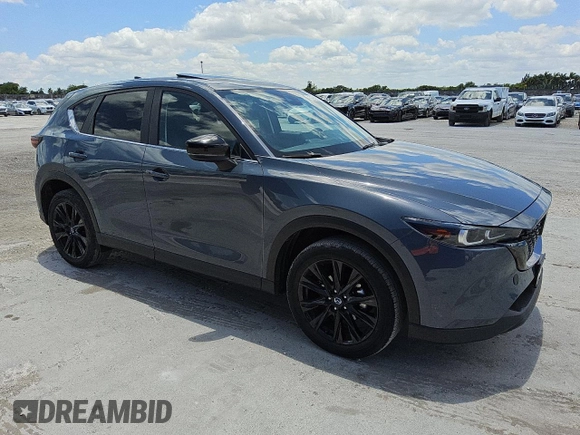 2024 Mazda CX-5 S Carbon Edition z VIN JM3KFBCL3R0481732, wystawiony jako Copart lot #56997135 z przebiegiem 32 887 mil mil oraz Tytuł czysty. Historia ofert i sprzedaży dostępna na DreamBid. Obrazek 4.