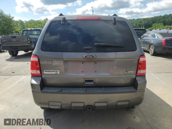 2011 Ford Escape XLT с VIN 1FMCU9DG8BKB02212, выставлен на аукционе Copart как лот 58200445 с пробегом 168 284 миль миль и Списание • Salvage title. История ставок и продаж доступна на DreamBid. Изображение 6.
