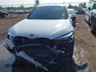 2021 BMW X1 xDrive28i with VIN WBXJG9C02M3M42379, listed as a IAAI auction lot 42476221 with 60,412 mi miles and . Bid and sale history available at DreamBid. Image 13.
