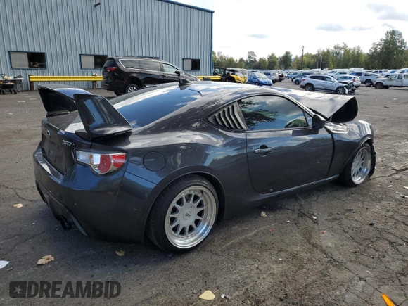 2015 Subaru BRZ Premium with VIN JF1ZCAB18F9602102, listed as a Copart auction lot 75958264 with 72,692 mi miles and Salvage title. Bid and sale history available at DreamBid. Image 3.