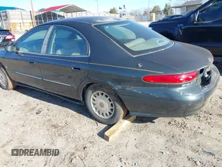 1998 Mercury Sable LS Premium Group z VIN 1MEFM53S0WA638842, wystawiony jako IAAI lot #41557457 z przebiegiem 153 443 mil mil oraz . Historia ofert i sprzedaży dostępna na DreamBid. Obrazek 3.