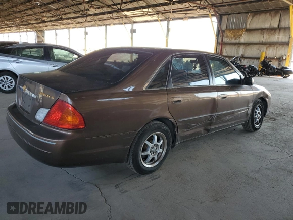 2000 Toyota Avalon XL z VIN 4T1BF28B3YU045264, wystawiony jako Copart lot #57519185 z przebiegiem 157 113 mil mil oraz Szkoda całkowita • Salvage title. Historia ofert i sprzedaży dostępna na DreamBid. Obrazek 3.