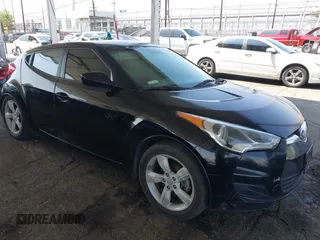 2013 Hyundai Veloster w/Black Int with VIN KMHTC6AD6DU088815, listed as a IAAI auction lot 42184776 with 204,930 mi miles and . Bid and sale history available at DreamBid. Image 1.