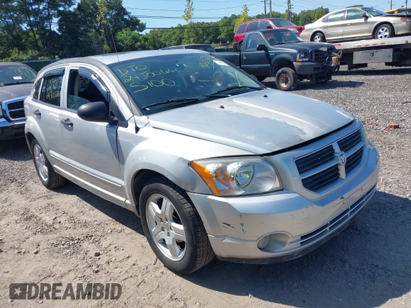 2008 Dodge Caliber SXT with VIN 1B3HB48B48D594124, listed as a IAAI auction lot 40282351 with 142,615 mi miles. Bid and sale history available at carsss.com. Image 1.