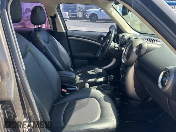 2012 MINI Countryman with VIN WMWZB3C52CWM05723, listed as a Copart auction lot 63713495 with 114,433 mi miles and Clean title. Bid and sale history available at DreamBid. Image 5.