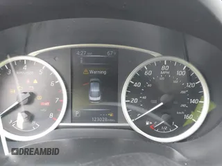 2018 Nissan Sentra S with VIN 3N1AB7AP2JY209169, listed as a IAAI auction lot 41942284 with 123,028 mi miles and . Bid and sale history available at DreamBid. Image 7.