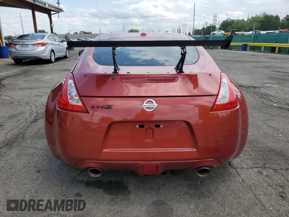 2013 Nissan 370Z Touring z VIN JN1AZ4EH9DM381350, wystawiony jako Copart lot #59375295 z przebiegiem 100 832 mil mil oraz Czysty tytuł • Clean title. Historia ofert i sprzedaży dostępna na DreamBid. Obrazek 6.