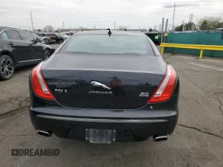 2014 Jaguar XJ Portfolio with VIN SAJWJ2GD4E8V69651, listed as a Copart auction lot 52426195 with 56,413 mi miles and Salvage title. Bid and sale history available at DreamBid. Image 6.