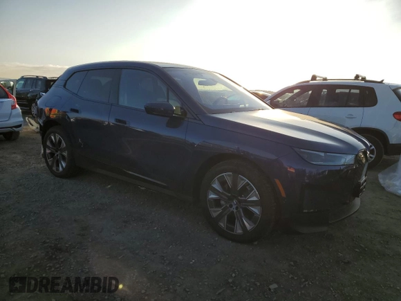 2025 BMW iX xDrive50 with VIN WB523CF01SCT04234, listed as a Copart auction lot 43649065 with 2,189 mi miles and Salvage Title. Bid and sale history available at carsss.com. Image 4.