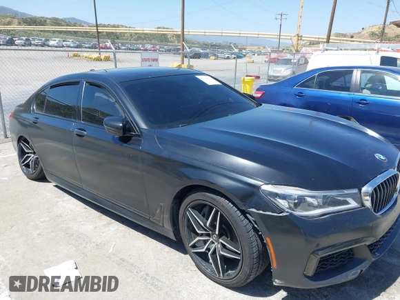 2018 BMW 7 Series 750i with VIN WBA7F0C51JGM23504, listed as a IAAI auction lot 39379378 with 82,251 mi miles. Bid and sale history available at carsss.com. Image 14.
