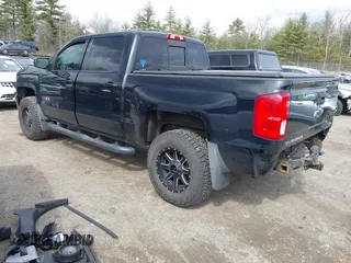 2018 Chevrolet Silverado 1500 LTZ with VIN 3GCUKSEC6JG111742, listed as a IAAI auction lot 42040811 with 148,283 mi miles. Bid and sale history available at carsss.com. Image 3.