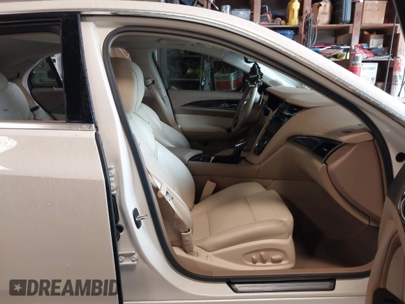 2014 Cadillac CTS Luxury AWD with VIN 1G6AX5S30E0181597, listed as a IAAI auction lot 41853975 with Not Provided miles and . Bid and sale history available at DreamBid. Image 5.