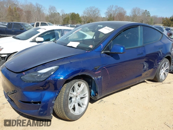 2023 Tesla Model Y Long Range with VIN 7SAYGDEE6PF847890, listed as a IAAI auction lot 41635687 with 32,846 mi miles and . Bid and sale history available at DreamBid. Image 18.