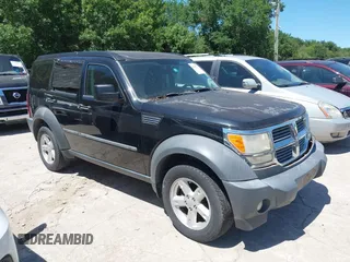 2007 Dodge Nitro SXT z VIN 1D8GT28K57W689694, wystawiony jako IAAI lot #42311713 z przebiegiem 141 344 mil mil oraz . Historia ofert i sprzedaży dostępna na DreamBid. Obrazek 1.