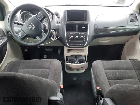 2014 Dodge Grand Caravan SE 30th Anniversary with VIN 2C4RDGBG9ER467543, listed as a Copart auction lot 87100594 with 393,038 mi miles and Clean Title. Bid and sale history available at DreamBid. Image 8.