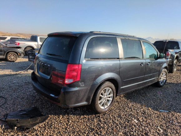 2014 Dodge Grand Caravan SXT with VIN 2C4RDGCG2ER262502, listed as a Copart auction lot 42058325 with 189,292 mi miles and Salvage Title. Bid and sale history available at carsss.com. Image 3.