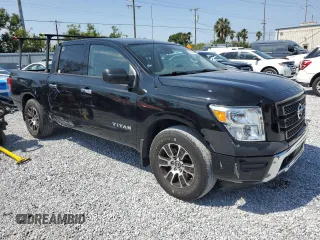 2021 Nissan Titan SV with VIN 1N6AA1EE9MN524930, listed as a Copart auction lot 52069845 with 44,280 mi miles and Salvage Title. Bid and sale history available at DreamBid. Image 4.