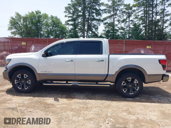 2024 Nissan Titan Pro-4X with VIN 1N6AA1ED7RN101486, listed as a IAAI auction lot 42243136 with 39,223 mi miles and . Bid and sale history available at DreamBid. Image 14.